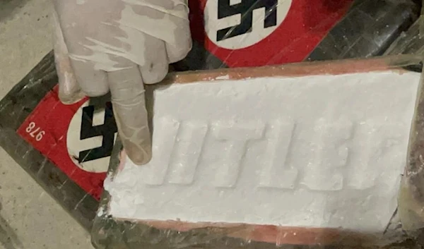 Cocaine bricks discovered in Peru had the word 'Hitler' written in high relief in the white powder and were covered with packaging bearing the Nazi swastika (AFP)