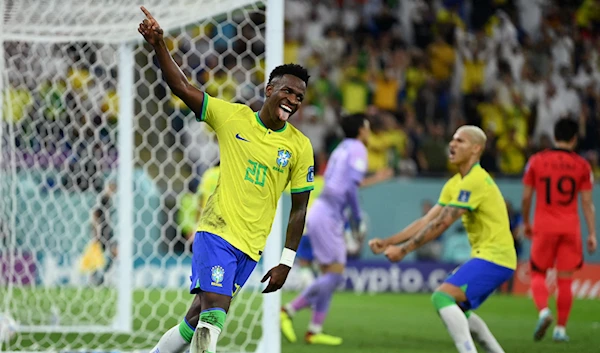 Brazilian forward Vinicius Junior celebrates Lucas Paqueta's goal against South Korea in the Round of 16 of the FIFA World CUP Qatar 2022, Stadium 974, Doha, Qatar, December 5 2022. (Reuters)