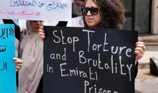 A supporter of Lebanese citizens detained in the United Arab Emirates protests in front of the Foreign Ministry headquarters in downtown Beirut, Lebanon on May 15(AP)