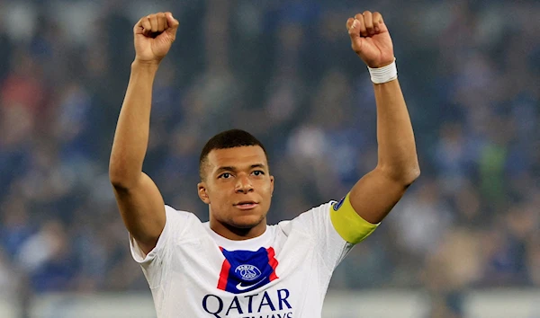 Kylian Mbappe celebrates after his team Paris Saint Germain secure their 11th Ligue 1 title, Strasbourg, France, May 27 2023. (Reuters)