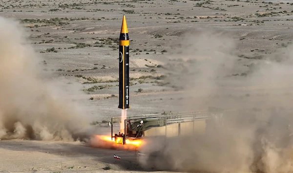 In this picture released by the Iranian Defense Ministry on Thursday, May 25, 2023, Khorramshahr-4 missile is launched at an undisclosed location, Iran (Iranian Defense Ministry via AP)