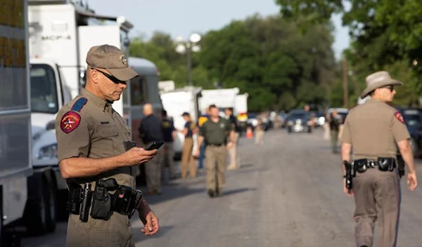 US gunman found hiding 17 miles from where he killed 5