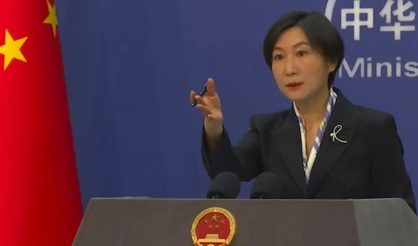 Chinese Foreign Ministry spokesperson Mao Ning gestures during a press conference at the Ministry of Foreign Affairs in Beijing, Wednesday, March 1, 2023.