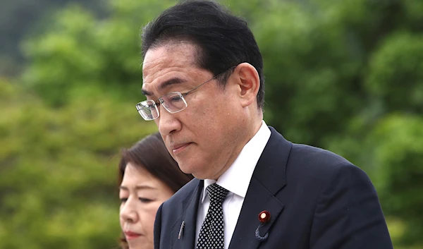 Japanese Prime Minister Fumio Kishida and his wife Yuko arrive at National Cemetery in Seoul, South Korea Sunday, May 7, 2023. (AP)