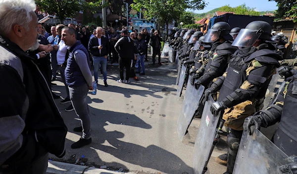 KFOR soldiers guard a municipal building in the town of Zvecan, northern Kosovo, Monday, May 29, 2023. (AP)