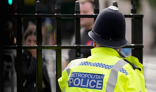 A Metropolitan police officer on patrol in London, on October 1, 2021 (AP)