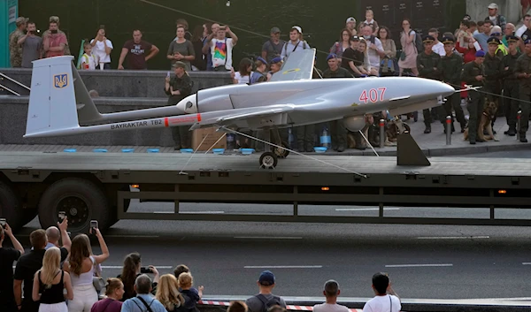 A Turkish-made Bayraktar TB2 drone is seen during a rehearsal of a military parade dedicated to Independence Day in Kiev, Ukraine, August 20, 2021 (AP)