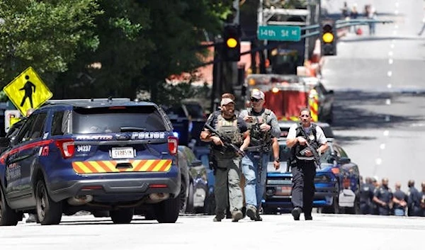 Law enforcement officers arrive near the scene of an active shooter on Wednesday, May 3, 2023 in Atlanta. (AP)