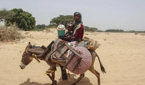 In this photo provided by UNICEF, refugees fleeing from the conflict in Sudan arrive in the village of Koufroun, near the Chad-Sudan border, in Chad Thursday, April 27, 2023. (AP)