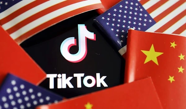 China and U.S. flags are seen near a TikTok logo in this illustration picture taken July 16, 2020 (Reuters)