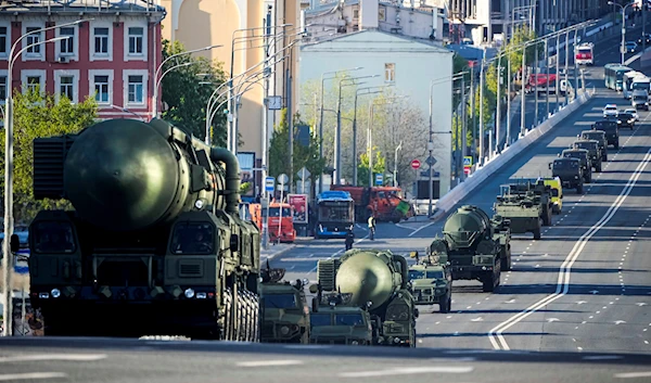 Russian RS-24 Yars ballistic missiles roll toward Red Square to attend a dress rehearsal for the Victory Day military parade in Moscow, Russia, Sunday, May 7, 2023 (AP Photo)