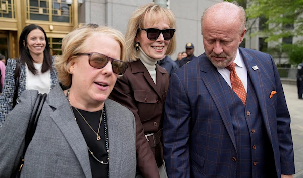 E. Jean Carroll, center, walks out of Manhattan federal court, May 9, 2023, in New York, the United States (AP)