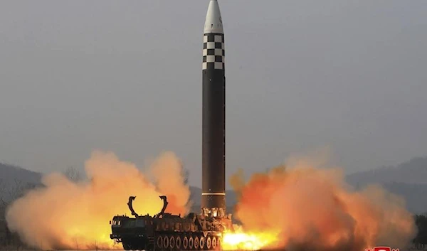 A view of a test launch of a new solid-fuel intercontinental ballistic missile (ICBM) Hwasong-18 at a