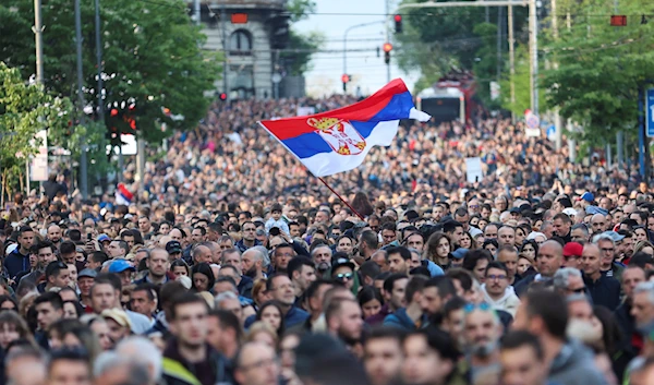 People attend a protest "Serbia against violence" in reaction to recent mass shootings that have shaken the country, in Belgrade, Serbia, May 8, 2023 (Reuters)