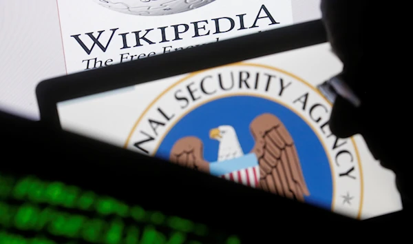 An illustration shows the logo of the National Security Agency in front of that of Wikipedia, March 11 2015. (Reuters)