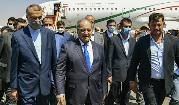 Syria's Foreign Minister Faisal Mekdad, receives Iran's new Foreign Minister Hossein Amir-Abdollahian  in Damascus, Syria, Sunday Aug. 29, 2021(AP)