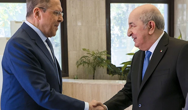 Russia’s foreign minister Sergey Lavrov met Tuesday with the president of Algeria Abdelmajid Tebboune on May 10, 2022. (AP)