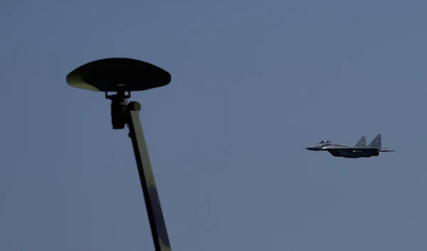 A Serbian army MiG-29 jet fighter performs during a military exercise, at Batajnica Air Base near Belgrade, Serbia, April 22, 2023 (AP)