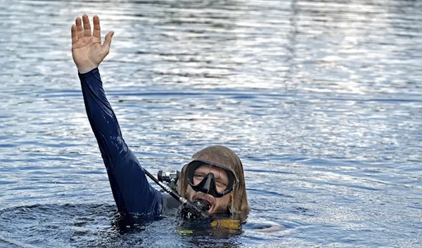 Dr. Joseph Ditur surfaces for the first time since March 1 in Key Largo, Florida, US, June 9 2023. (AP)