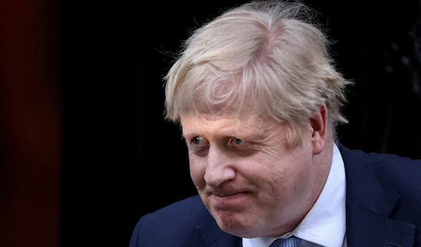 Then British Prime Minister Boris Johnson walks along 10 Downing Street in London, UK, January 31 2022. (Reuters)