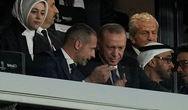 Turkish President Recep Tayyip Erdogan with UEFA president Aleksander Ceferin while attending the Champions League final soccer match between Manchester City and Inter Milan at the Ataturk Olympic Stadium in Istanbul, Turkey, June 10, 2023 (AP)