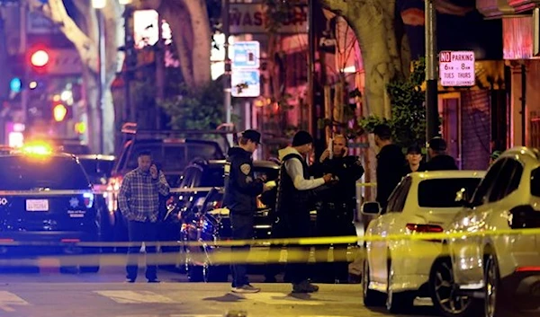 Police secure and investigate the scene of a shooting in San Francisco on June 9, 2023. (San Francisco Chronicle via AP)