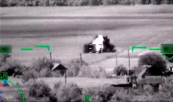 This photo taken from video released by Russian Defense Ministry Press Service on Tuesday, June 6, 2023, shows a Ukrainian tank being hit by a Russian missile. (AP)