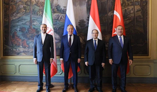 Iran's Foreign Minister Hossein Amir-Abdollahian, Russia's Foreign Minister Sergei Lavrov, Syria's Foreign Minister Faisal Mekdad, and Turkey's Foreign Minister Mevlut. (AFP)