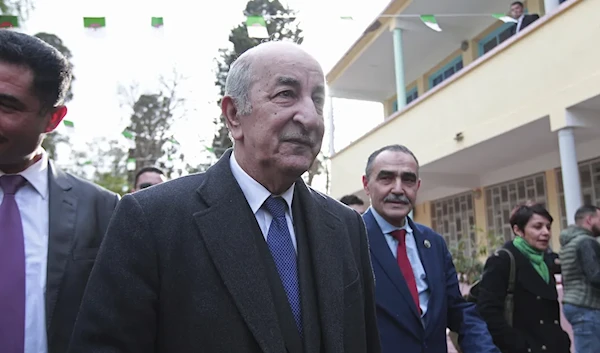 Algerian President Abdelmadjid Tebboune at a polling station in December 2019 in Algiers (AP)