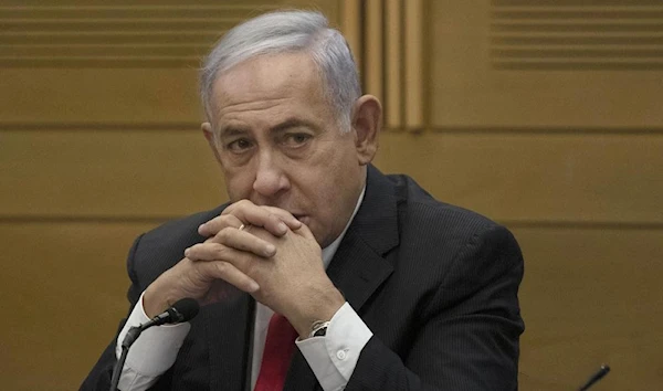 Benjamin Netanyahu speaks to right-wing, then, opposition party members at the Knesset, occupied Al-Quds, Palestine, June 14 2021. (AP)