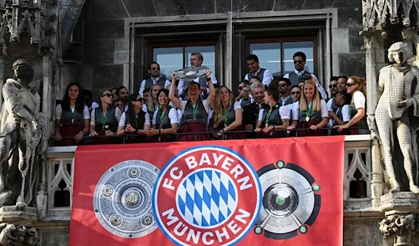 Bayern Munich's men's and women's team celebrate winning their respective Bundesliga titles at the end of the 2022-23 season (AFP)