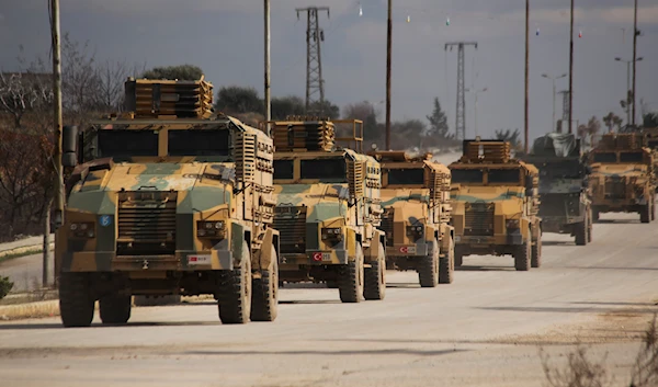 Turkish occupation forces convoy drives in Idlib province, Syria, Saturday, Feb. 22, 2020 (AP Photo/Ghaith Alsayed)