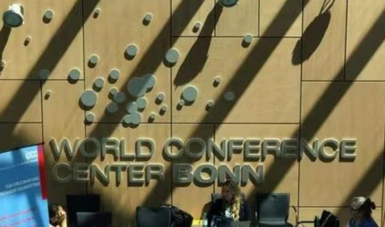 Visitors sit inside the World Conference Center Bonn during the Climate Change Conference in Bonn, western Germany on June 13, 2023. (AFP)