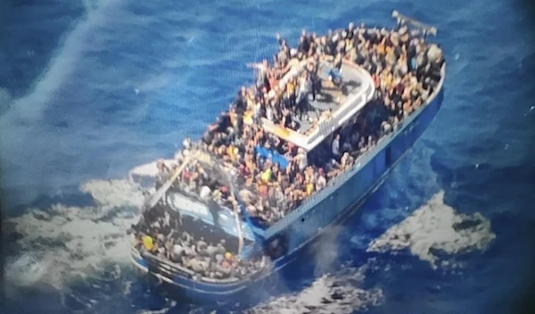 This undated handout image provided by Greece's coast guard on Wednesday, June14, 2023, shows scores of people covering practically every free stretch of deck on a battered fishing boat that later capsized and sank off southern Greece (AP)