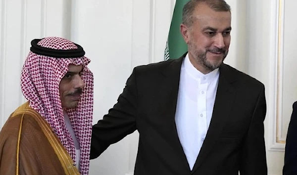 Iranian Foreign Minister Hossein Amir-Abdollahian and his Saudi Arabian counterpart Prince Faisal bin Farhan during his visit to Tehran. (AFP)