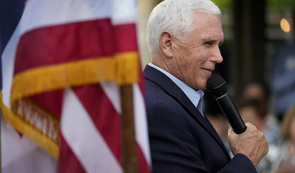 Former Vice President Mike Pence speaks to local residents during a meet and greet, Tuesday, May 23, 2023, in Des Moines, Iowa. (AP Photo/Charlie Neibergall)