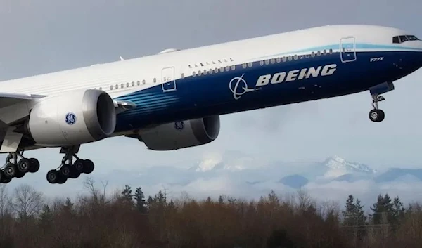 The 252-foot-long passenger jet airplane, the 777X, during its first test flight in 2020. (AFP)