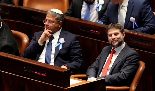 aafhoseogjsIsraeli right-wing Knesset member Itamar Ben-Gvir (left) and Bezalel Smotrich look on during the swearing-in ceremony for Israeli lawmakers at the Knesset, Israel's parliament, in Jerusalem in November 2022 (AP)