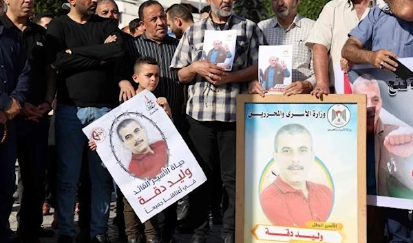 At a rally to demand the release of Walid Daqqa, in Gaza City, May 25, 2023. (AFP)