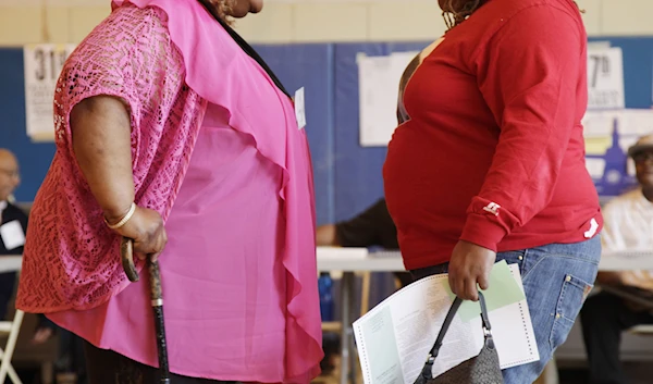 In this file photo dated Tuesday, June 26, 2012, two overweight women hold a conversation in New York, USA.(AP)