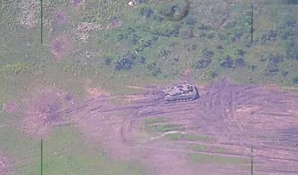 Screen grab from a drone footage featuring a disabled/destroyed Ukrainian German-made Leopard 2A6 tank during the Ukrainian counter offensive, June 2023 (Russian MoD)