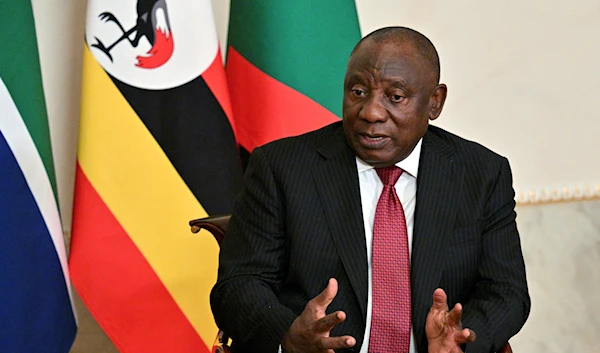 South African President Cyril Ramaphosa gestures while speaking to Russian President Vladimir Putin during their talks after a meeting with a delegation of African leaders and senior officials in St. Petersburg, Russia, June 17, 2023 (AP)