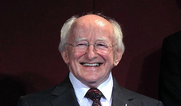 Newly elected Irish President Michael Higgins smiles during the official announcement of the election results in 2011 (AP)