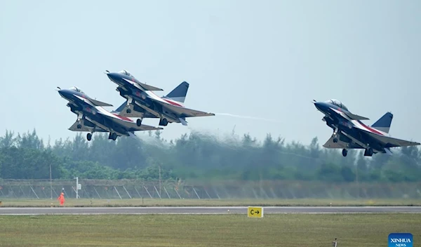 Aircrafts of the Bayi Aerobatic Team conduct training for the upcoming 14th Airshow China in south China's Guangdong Province Nov. 6, 2022. (Xinhua)