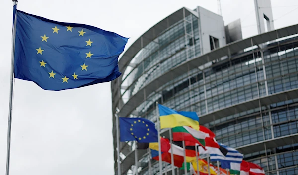 The European flag, left, flies Tuesday, April 18, 2023 at the European Parliament in Strasbourg, eastern France. (AP)