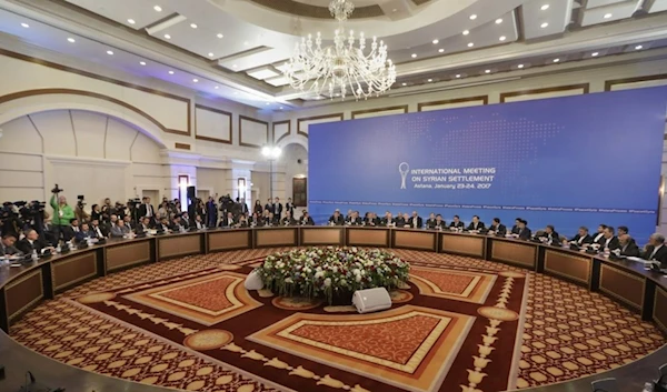 Delegations of Russia, Iran and Turkey hold talks on Syrian peace at a hotel in Astana, Kazakhstan, Monday, Jan. 23, 2017. (AP)