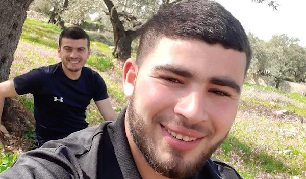 A photo of the two martyred Al-Quds Brigades fighter, Muhannad Faleh Abdullah Shehadeh and Khaled Mostafa Abel-Latif Sabah. (Social media)