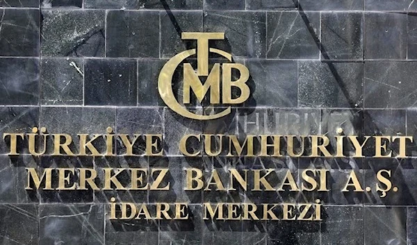 A picture shows the logo of Turkey's Central Bank (TCMB) at the entrance of the bank's headquarters in Ankara, Turkey. (AFP)