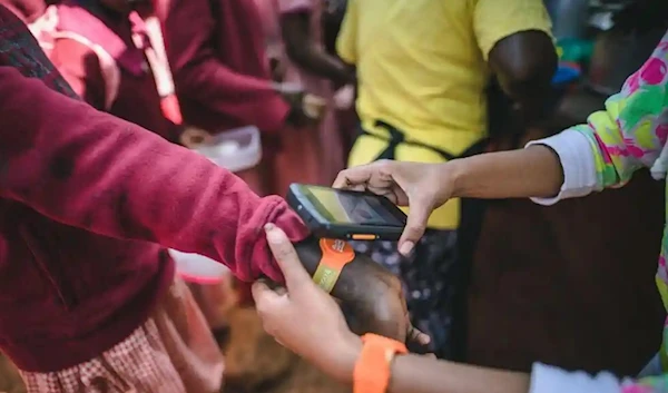 Children can buy their lunches using Tap2Eat pre-pay wristbands. (Courtesy of Food4Education)