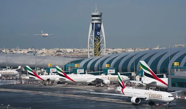 In this Dec. 11, 2019 file photo, an Emirates jetliner comes in for landing at Dubai International Airport in Dubai, United Arab Emirates. (AP)